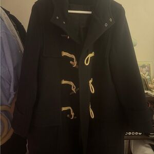 S.E.H KELLY duffle coat in dark navy heavy melton wool with added lining.